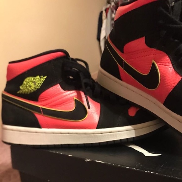 jordan 1 mid black hot punch